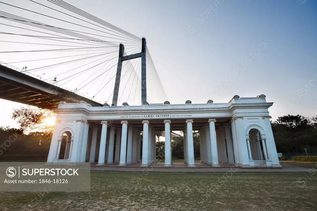 Facade of a memorial with bridge in the background, Prinsep Ghat, Kolkata, West Bengal, India