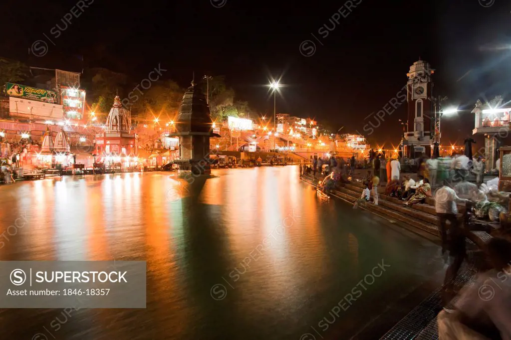 Illuminated temples at Har Ki Pauri at night, River Ganges, Haridwar, Uttarakhand, India