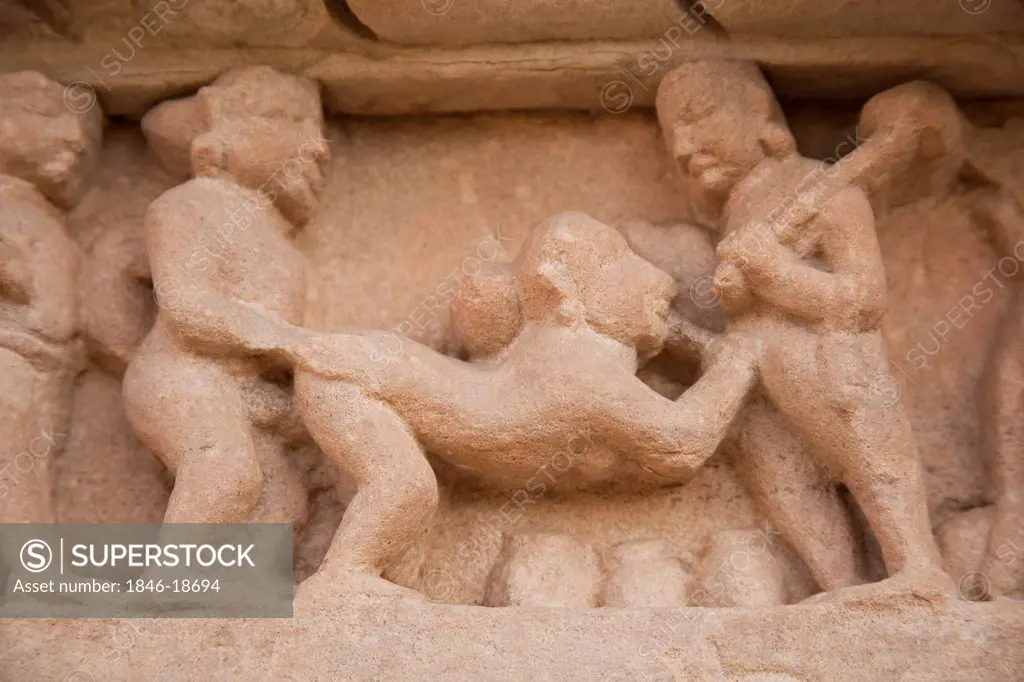 Detail of erotic sculptures at a temple, Khajuraho, Chhatarpur District, Madhya Pradesh, India