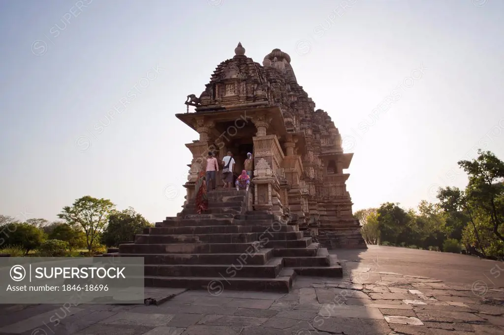 Tourists at a temple, Khajuraho, Chhatarpur District, Madhya Pradesh, India