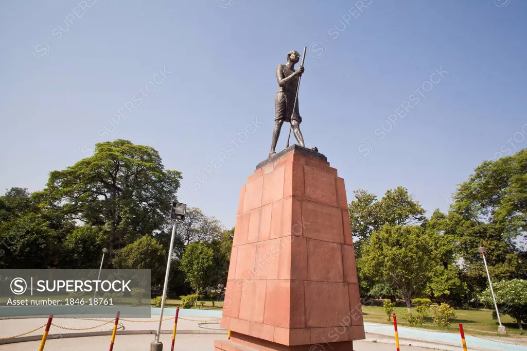 Low angle view of the statue of Mahatma Gandhi the famous freedom fighter of India, Maharaja Ranjit Singh Panorama, Lawrence Road, Amritsar, Punjab, I...