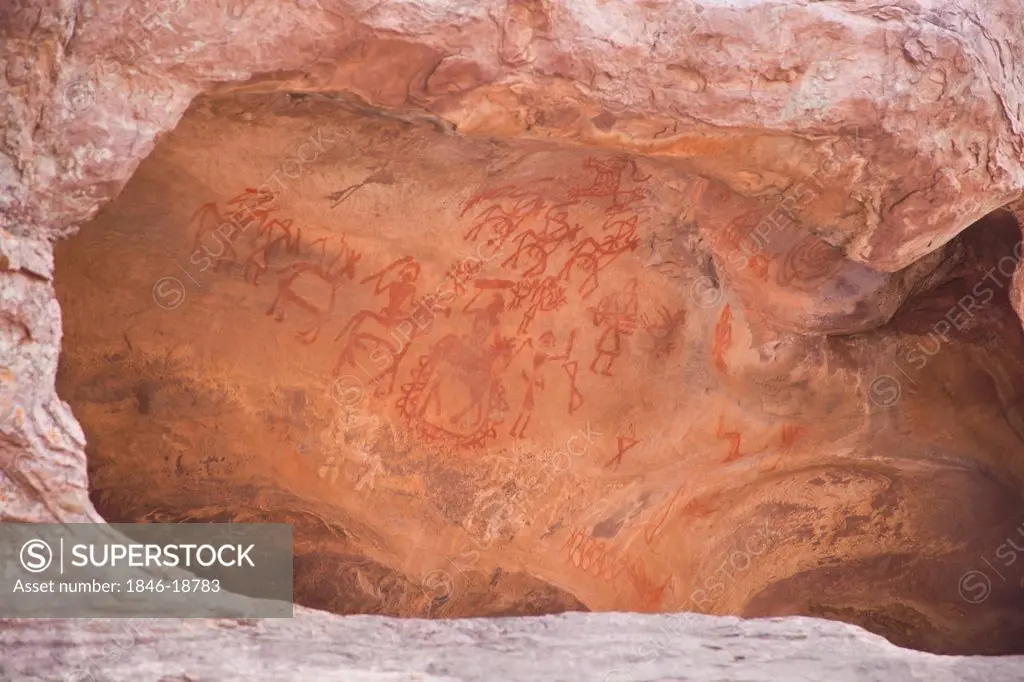 Close-up of a cave paintings of people riding horses, Bhimbetka Rock Shelters, Raisen District, Madhya Pradesh, India