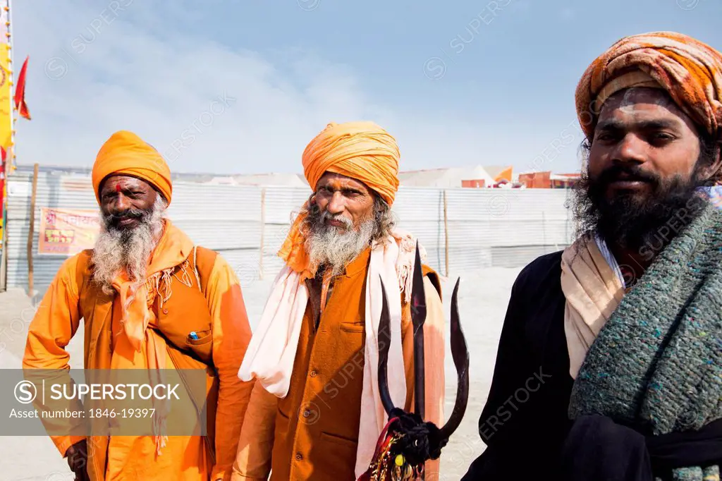 Portrait of three sadhus in Kumbha Mela, Allahabad, Uttar Pradesh, India