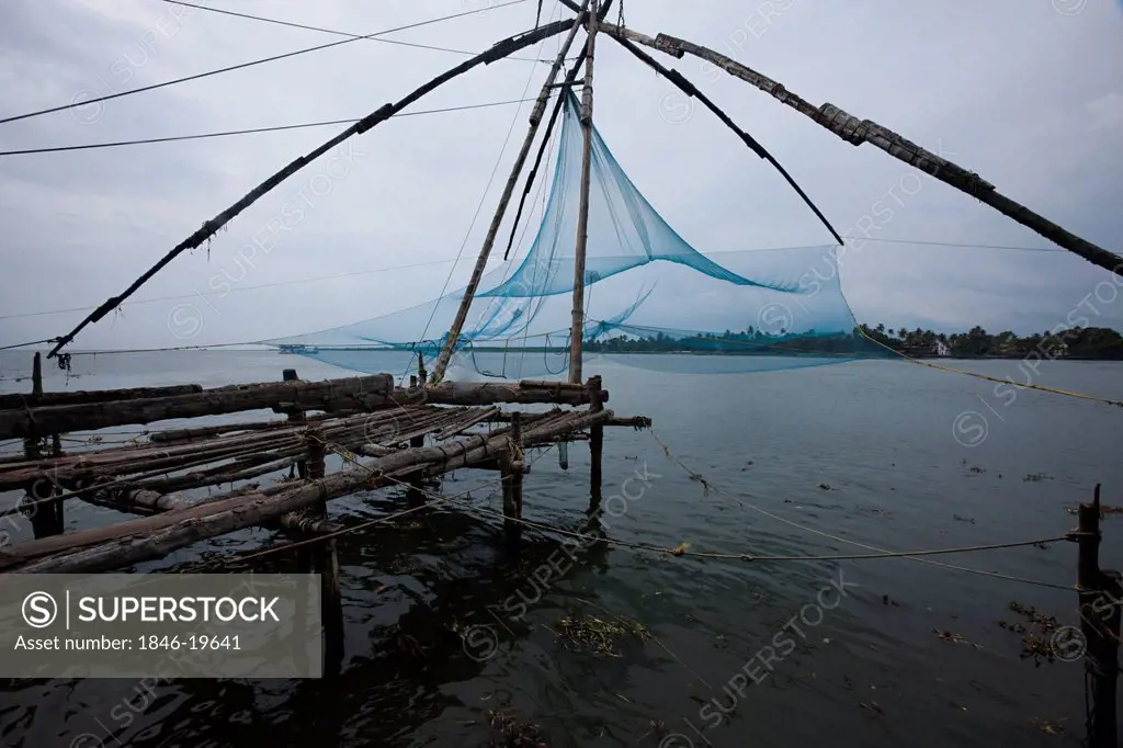 Chinese fishing net at a harbour, Fort Cochin, Cochin, Kerala, India