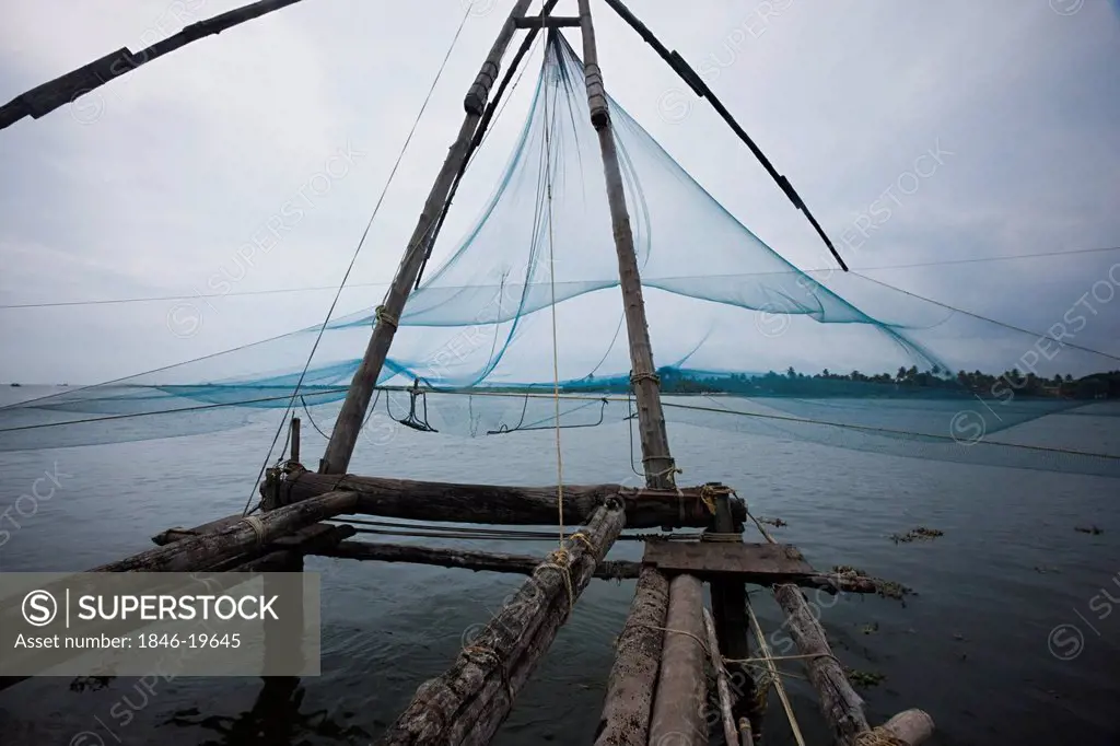 Chinese fishing net at a harbour, Fort Cochin, Cochin, Kerala, India
