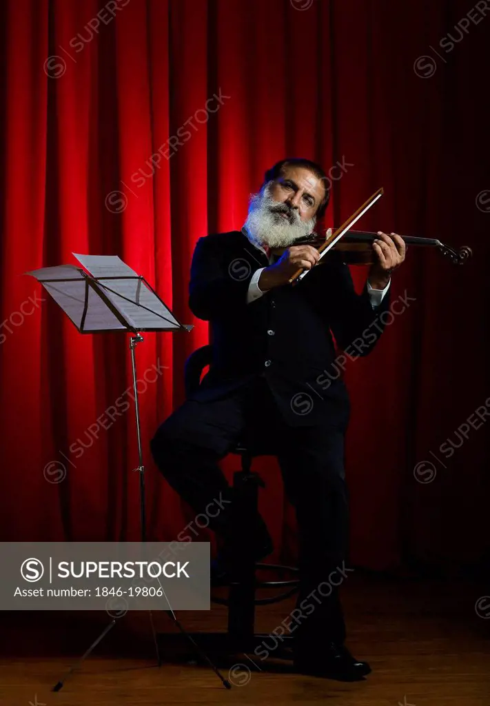 Violinist performing in a concert