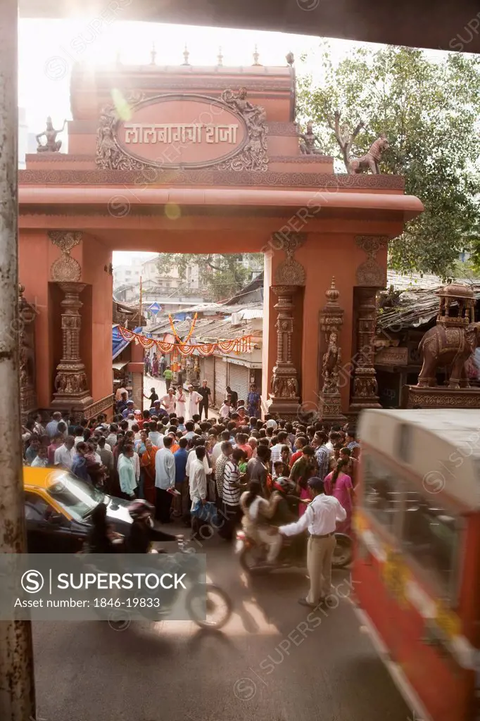 Crowd at the entrance of a temple during religious procession of Ganpati visarjan ceremony, Mumbai, Maharashtra, India