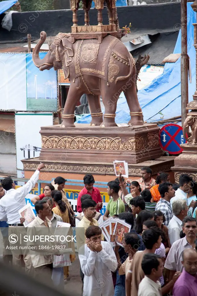 People at a temple during religious procession, Mumbai, Maharashtra, India