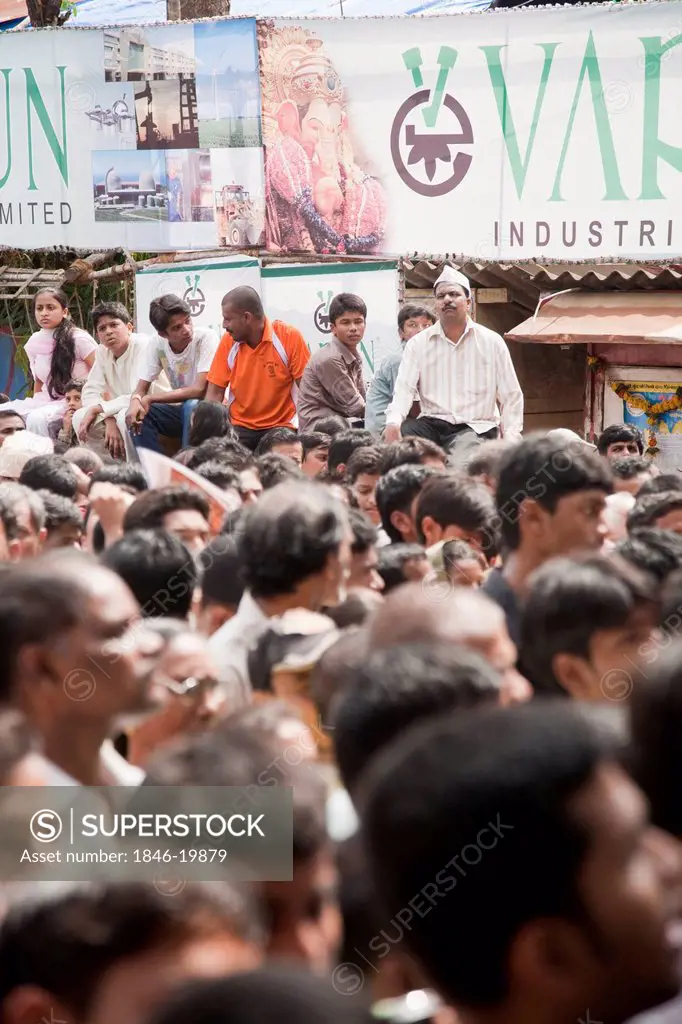Crowd at a religious procession during Ganpati visarjan ceremony, Mumbai, Maharashtra, India