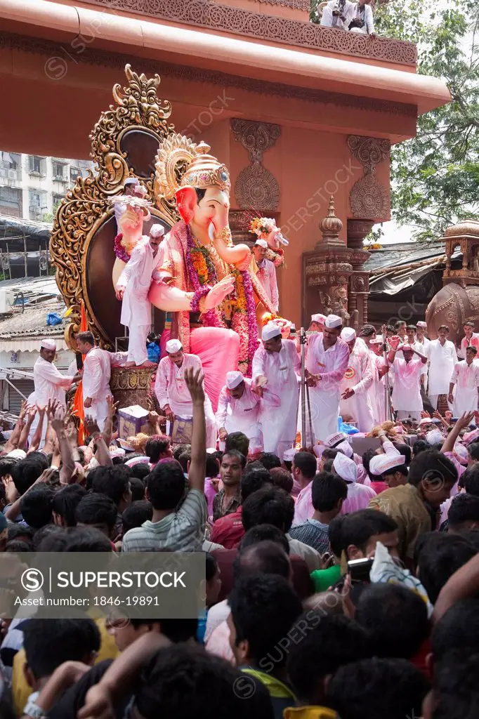 Crowd at religious procession during Ganpati visarjan ceremony, Mumbai, Maharashtra, India