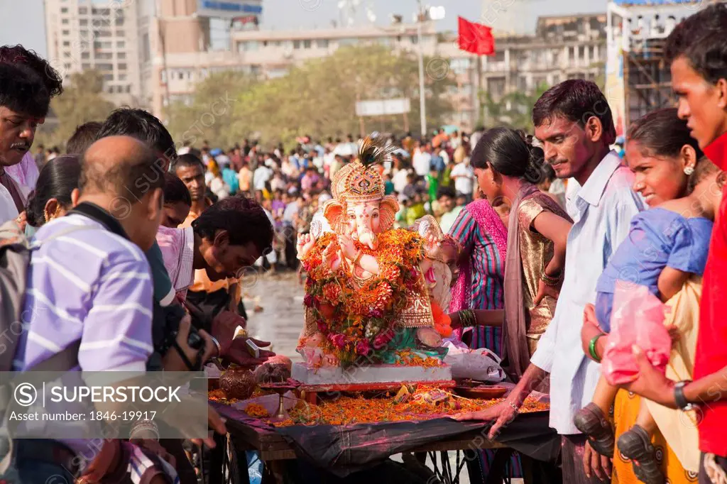 People at the immersion ceremony of Lord Ganesha, Mumbai, Maharashtra, India