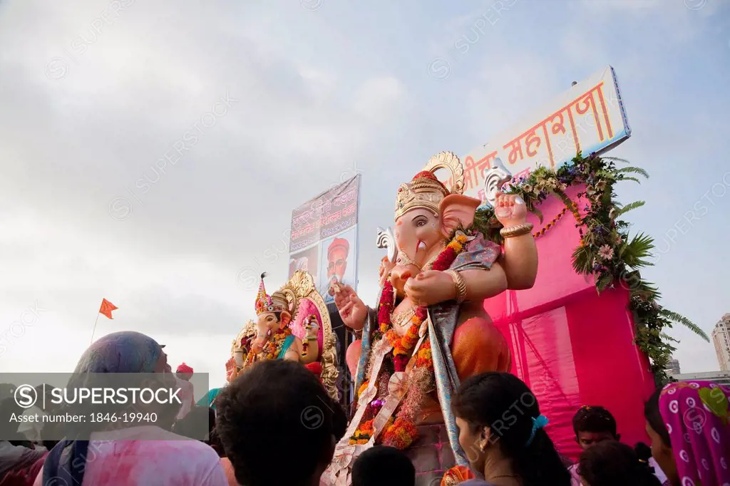 People at religious procession during Ganpati visarjan ceremony, Mumbai, Maharashtra, India
