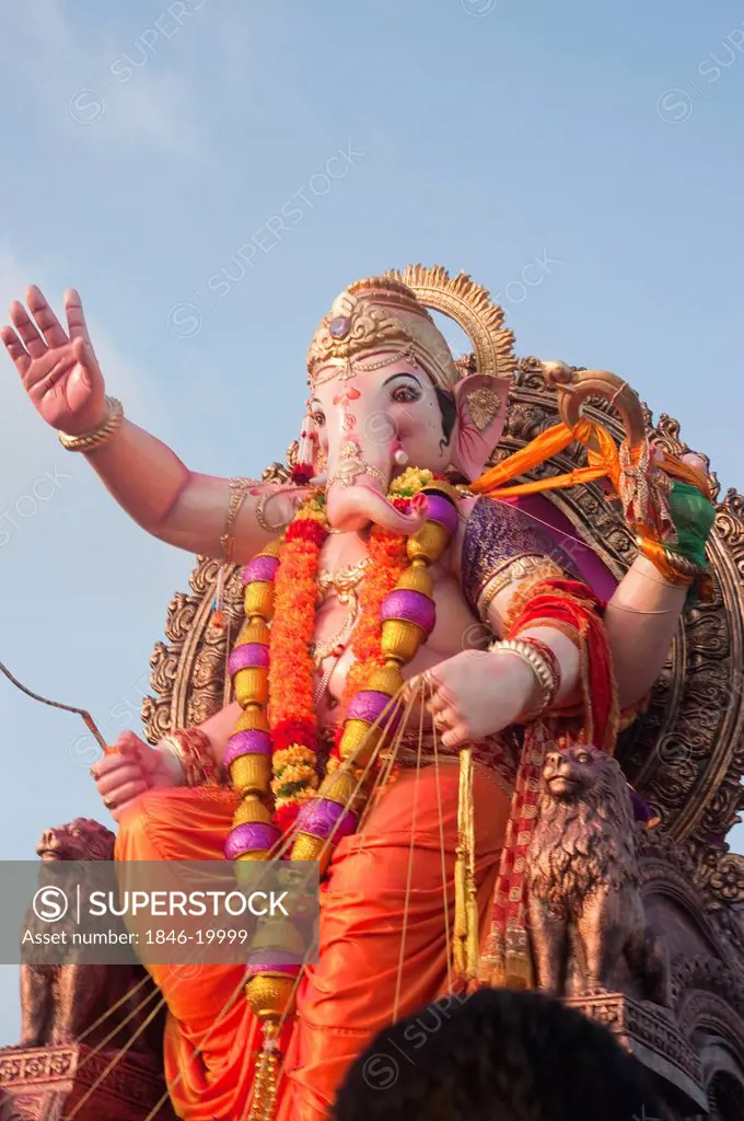 Idol of Lord Ganesha at religious procession during Ganpati visarjan ceremony, Mumbai, Maharashtra, India
