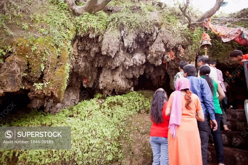 People praying in a cave, Baba Dhansar, Jammu And Kashmir, India