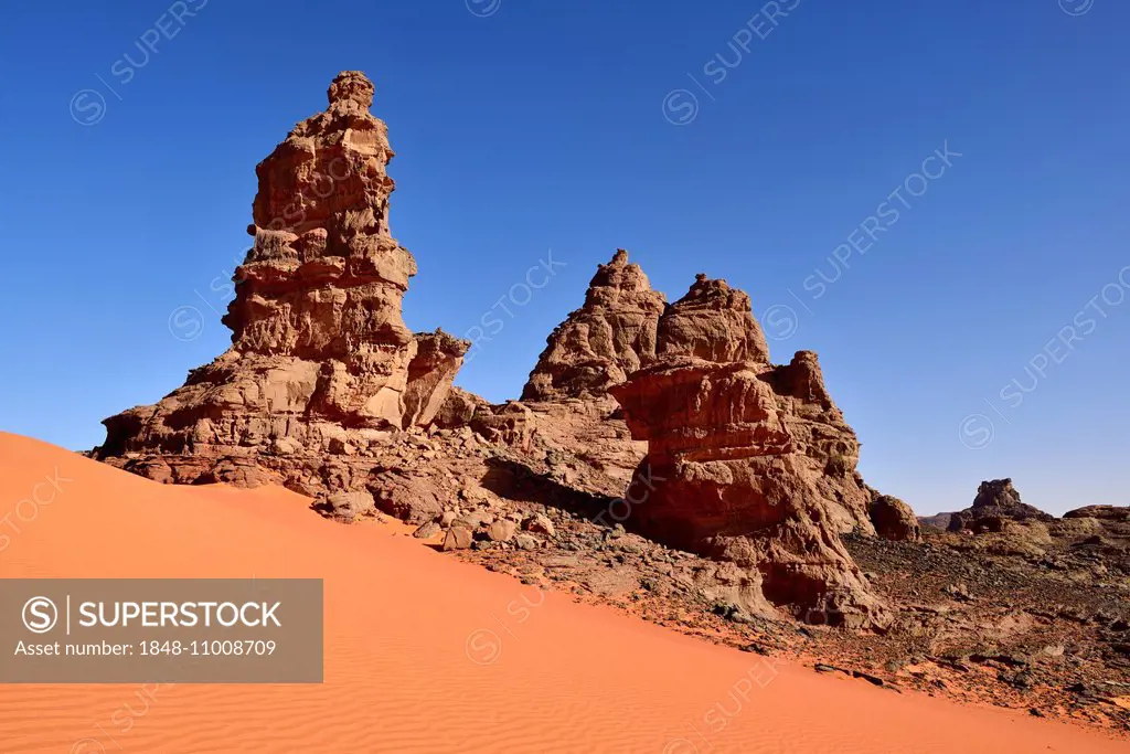 Rock towers and sand dunes at the Cirque, Tadrart region, Tassili nAjjer National Park, Unesco World Heritage Site, Algeria, Sahara, North Africa
