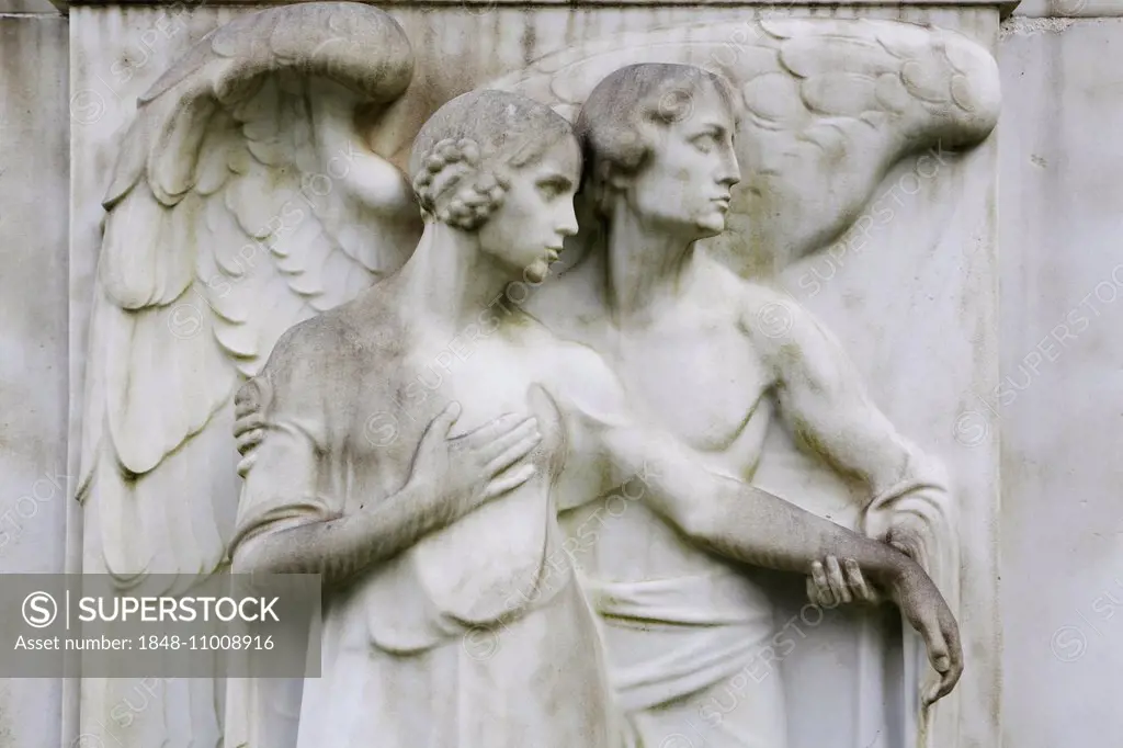 Angel and a female figure on a gravestone, Melatenfriedhof cemetery, Cologne, North Rhine-Westphalia, Germany