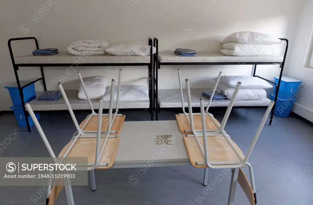 Chairs on a table, bunk beds, container accommodation for asylum seekers, Geretsried, Upper Bavaria, Bavaria, Germany
