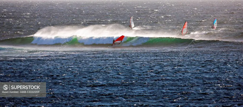 Wind surfers and breaking wave, Margaret River, Western Australia, Australia