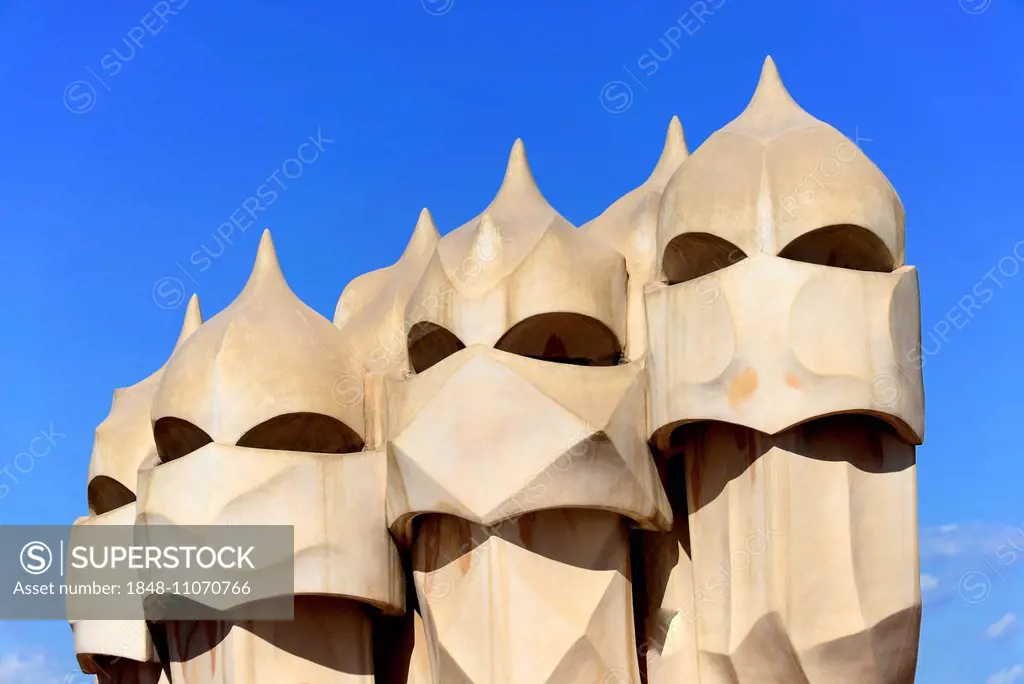 Sculptural ventilation shafts on the roof of Casa Mila or La Pedrera by Antoni Gaudi, UNESCO World Heritage Site, Passeig de Gracia, Barcelona, Spai...