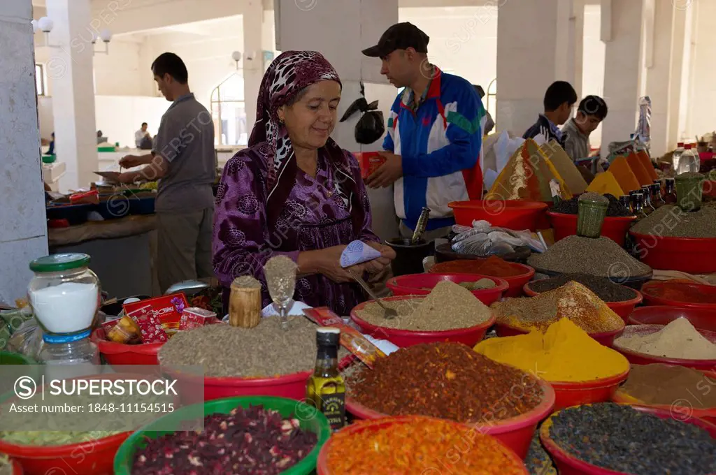 Spice seller at a bazaar, Bukhara, Uzbekistan