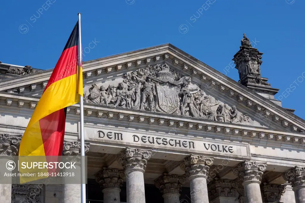 German flag at the Reichstag parliament, Berlin, Germany