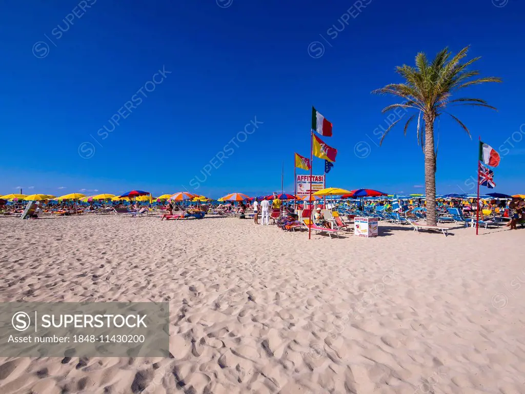The lively beach of the resort of San Vito lo Capo, Province of Trapani, Sicily, Italy