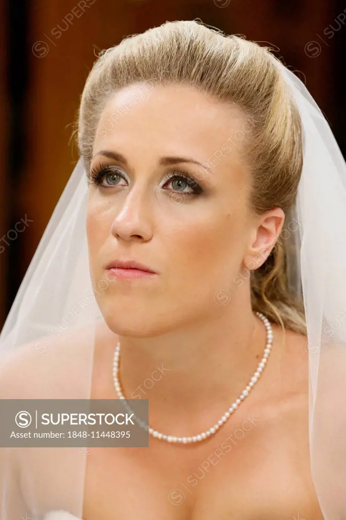 Portrait of the bride at the altar