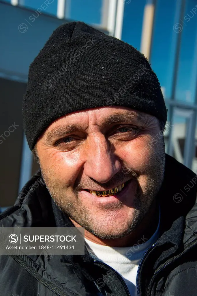 Portrait, friendly Chechen man with gold teeth, Chechnya, Caucasus, Russia