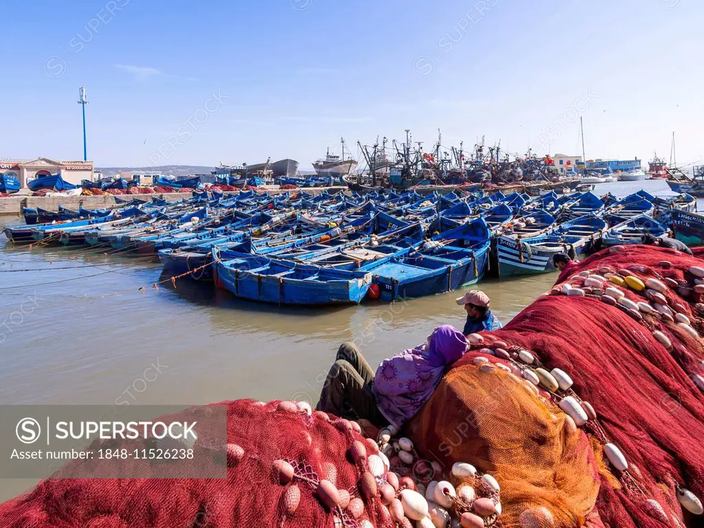 Old blue fishing boats in the port of Essaouira, Unesco World Heritage Site, Morocco