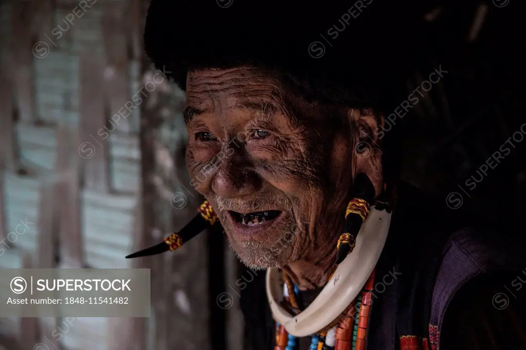 Old warrior in traditional dress, Nagaland, India