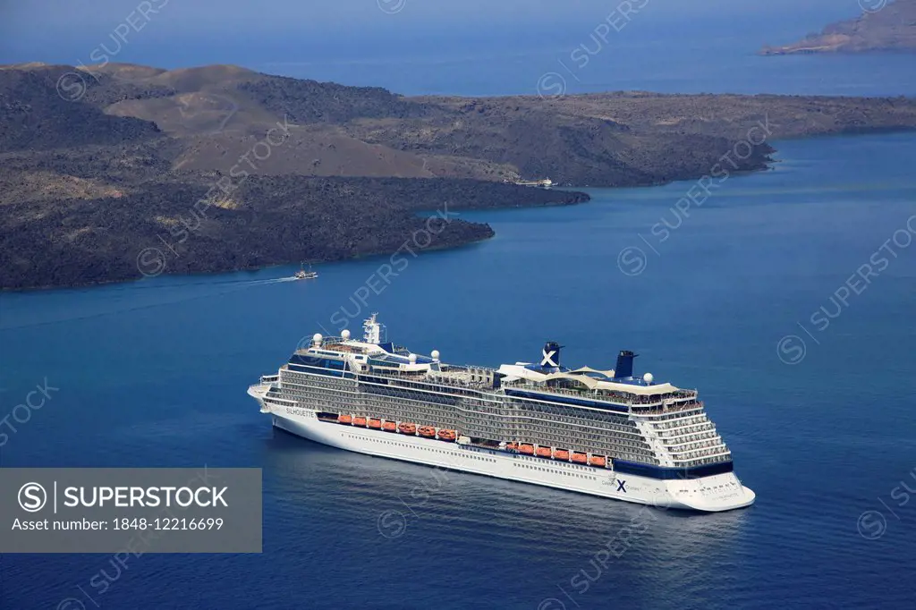 Cruise ship in the caldera, crater of Nea Kameni, volcanic island, in Thira, Santorini, Cyclades, Aegean Sea, Greece
