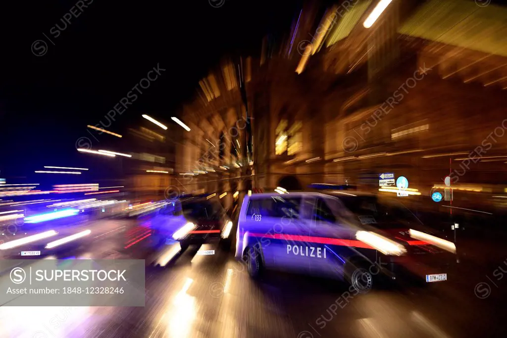 Police car in action, demonstration against PEGIDA at the Opernring, Innere Stadt, Vienna, Austria