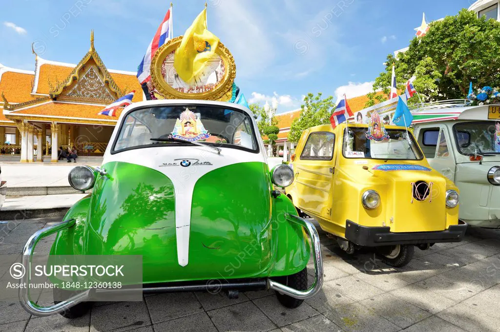 BMW Isetta, vintage car exhibition, Wat Ratchanatda at the back, Bangkok, Thailand