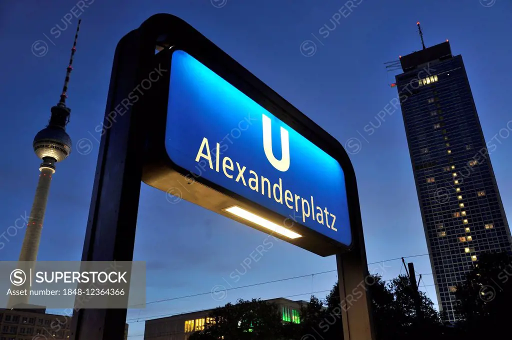 Entrance to the subway station at Alexanderplatz square, at dusk, Berlin, Germany