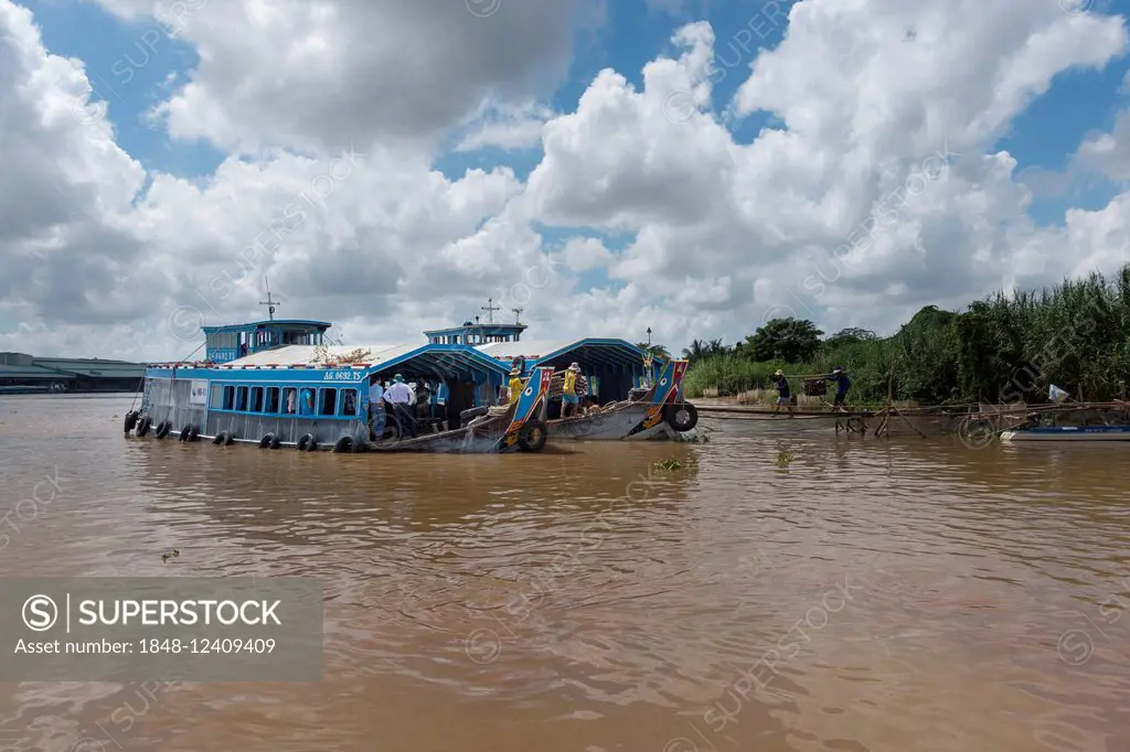 Transport ships on the Mekong River, Mekong Delta, Vietnam Asia