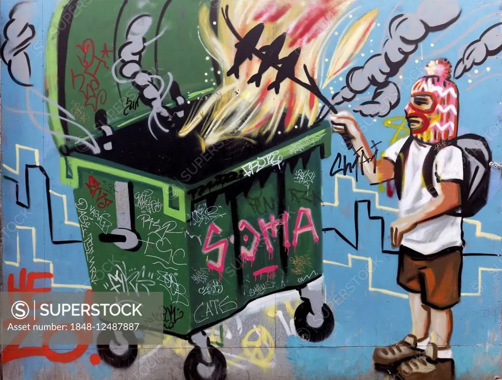 Man with facemask grilling fish over a fire in a dumpster, mural, street art, Palma de Majorca, Majorca, Balearic Islands, Spain
