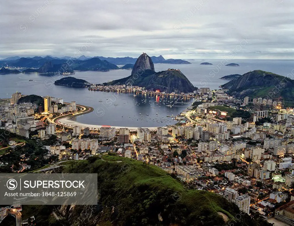 Rio de Janeiro viewed from Mt. Corcovado, Botafogo, Sugarloaf, Copacabana and Ipanema, twilight, Brazil, South America