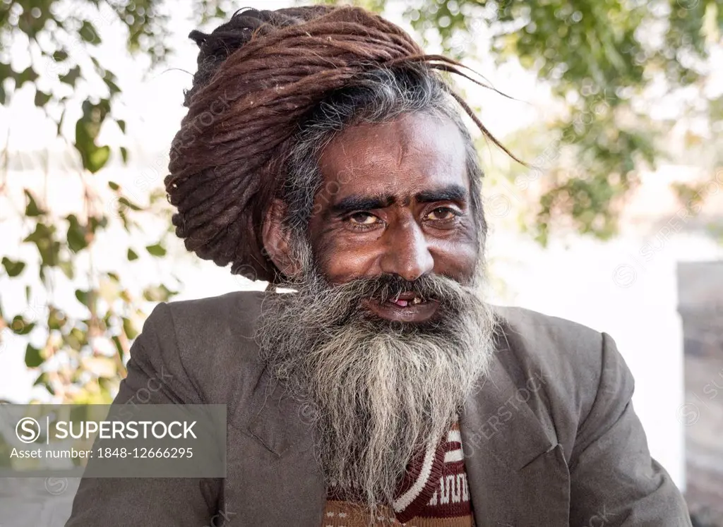 Smiling Rajasthani with matted hair and beard, Jaisalmer, Rajasthan, India