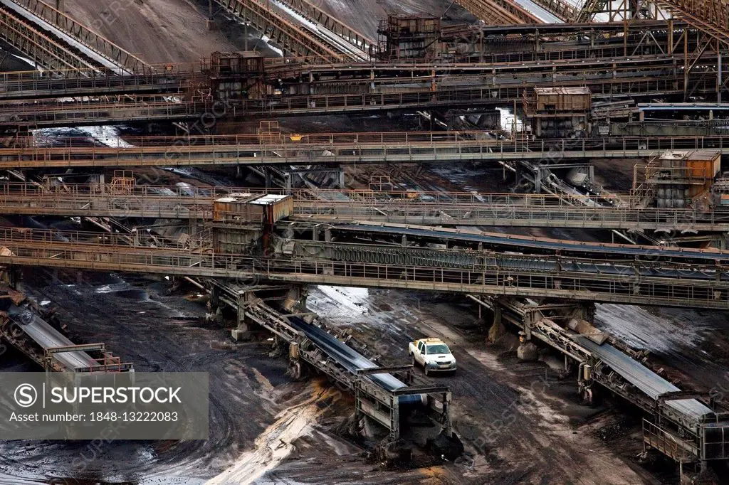 Conveyors lignite Inden opencast mine, with a car, Rhenish lignite mining area, Common Inden, North Rhine-Westphalia, Germany, Europe