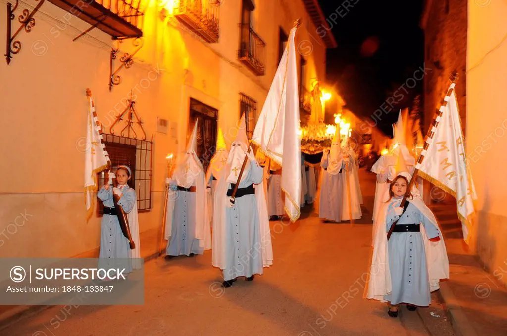 Penitents wearing penitential robes (nazareno), Holy Week procession, Semana Santa, Belmonte, Castilla-La Mancha region, Spain