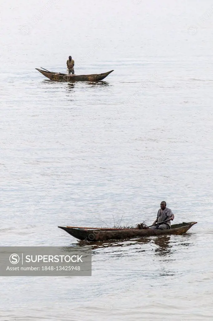 Two fishermen in a pirogue, logboat, Kribi, Southern Region, Cameroon