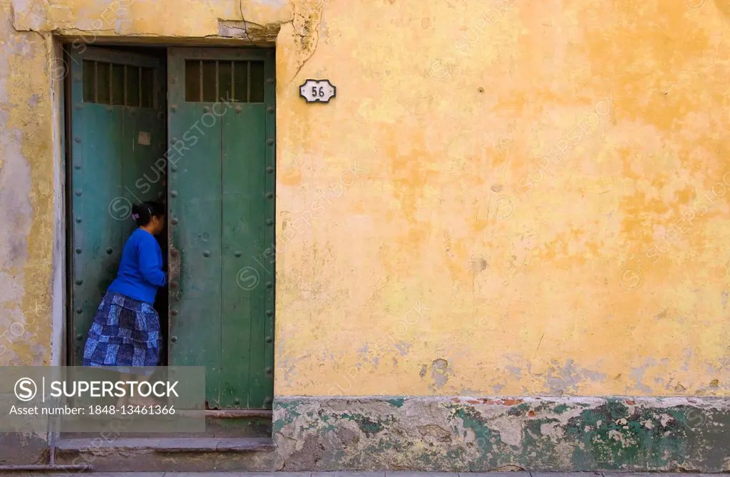 Woman entering house, Old Havana, Havana, Cuba