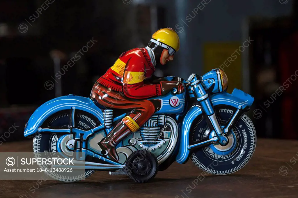 Tin Toys from the 1950s, finished motorcyclists in front of an old squeezing machine in the factory, tin toys, Emskirchen, Brunn, Upper Franconia, Bav...