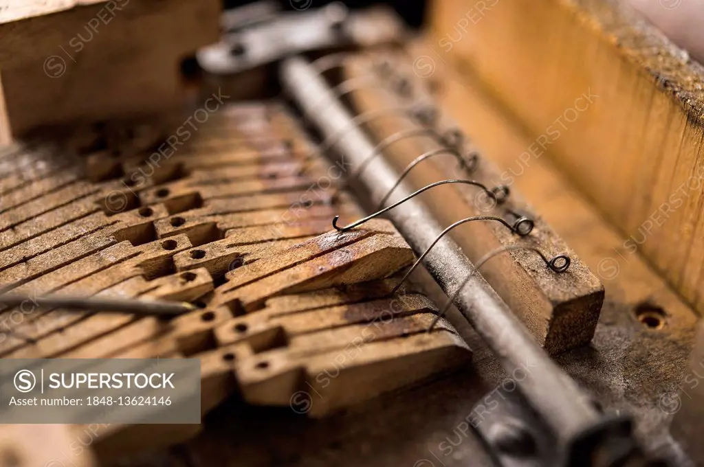 Metal springs on wooden valves are tested, barrel organ manufacture, Grassau, Upper Bavaria, Bavaria, Germany