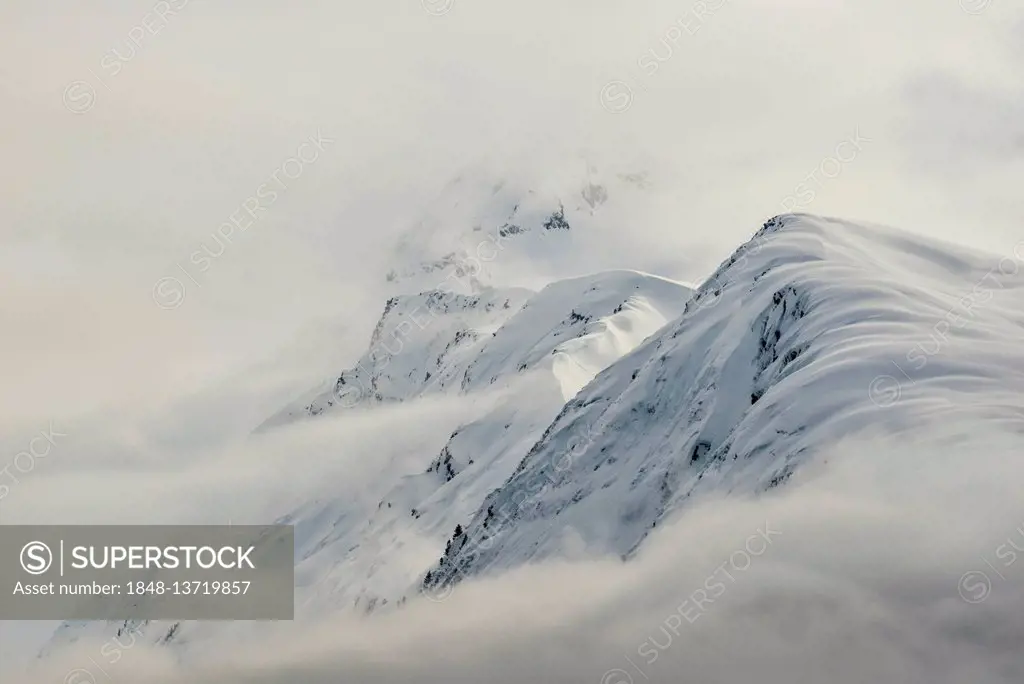 Mountains with snow and clouds, Chugach Mountains, Prince William Sound, Alaska