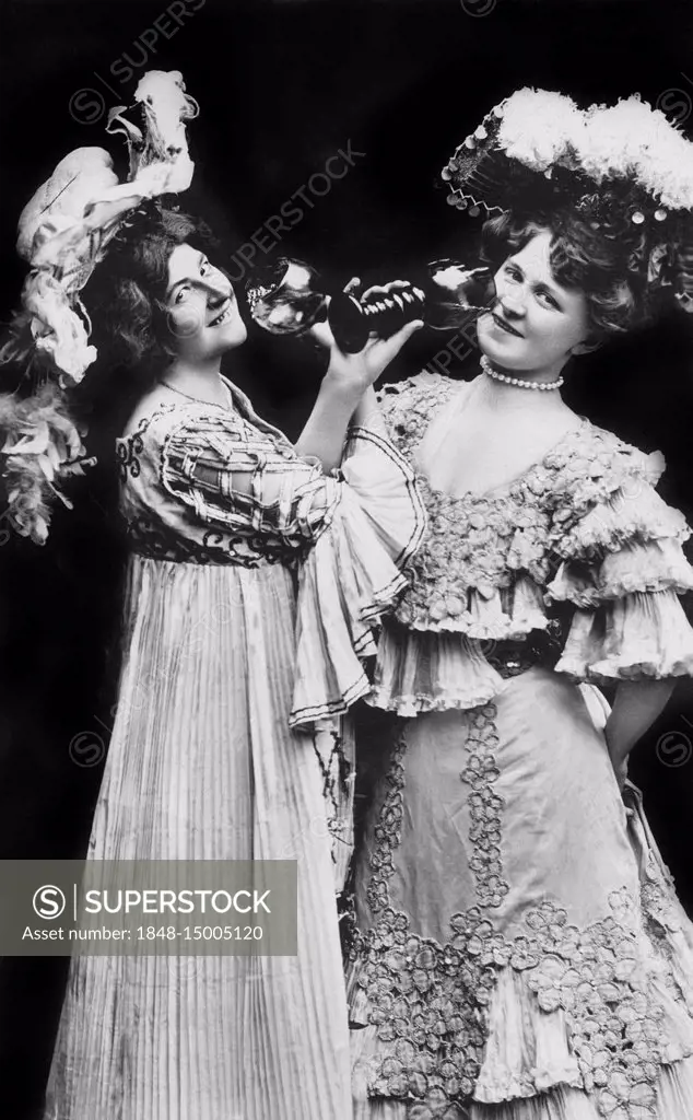 Two women drinking wine, 1910s, Germany