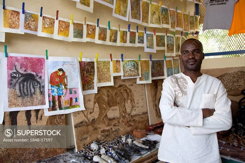 The artist Zacharia is selling his works on a handicraft market, Livingstone, Southern Province, Republic of Zambia, Africa