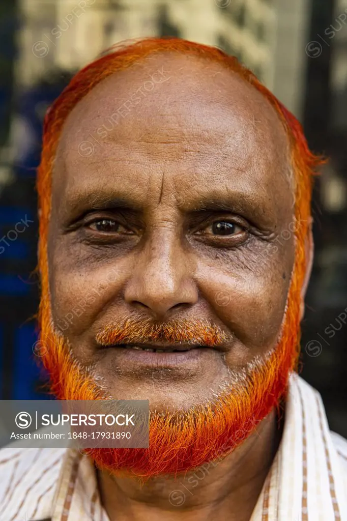 Man with a coloured beard, Kawran Bazar, Dhaka, Bangladesh, Asia