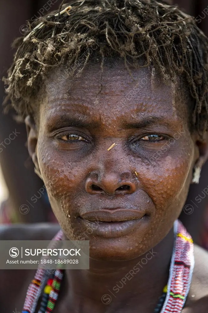 Woman with beauty scars from the Toposa tribe, Eastern Equatoria, South Sudan, Africa