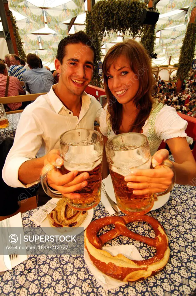 Couple in a beer tent, Wies'n, Oktoberfest, Munich, Bavaria, Germany, Europe